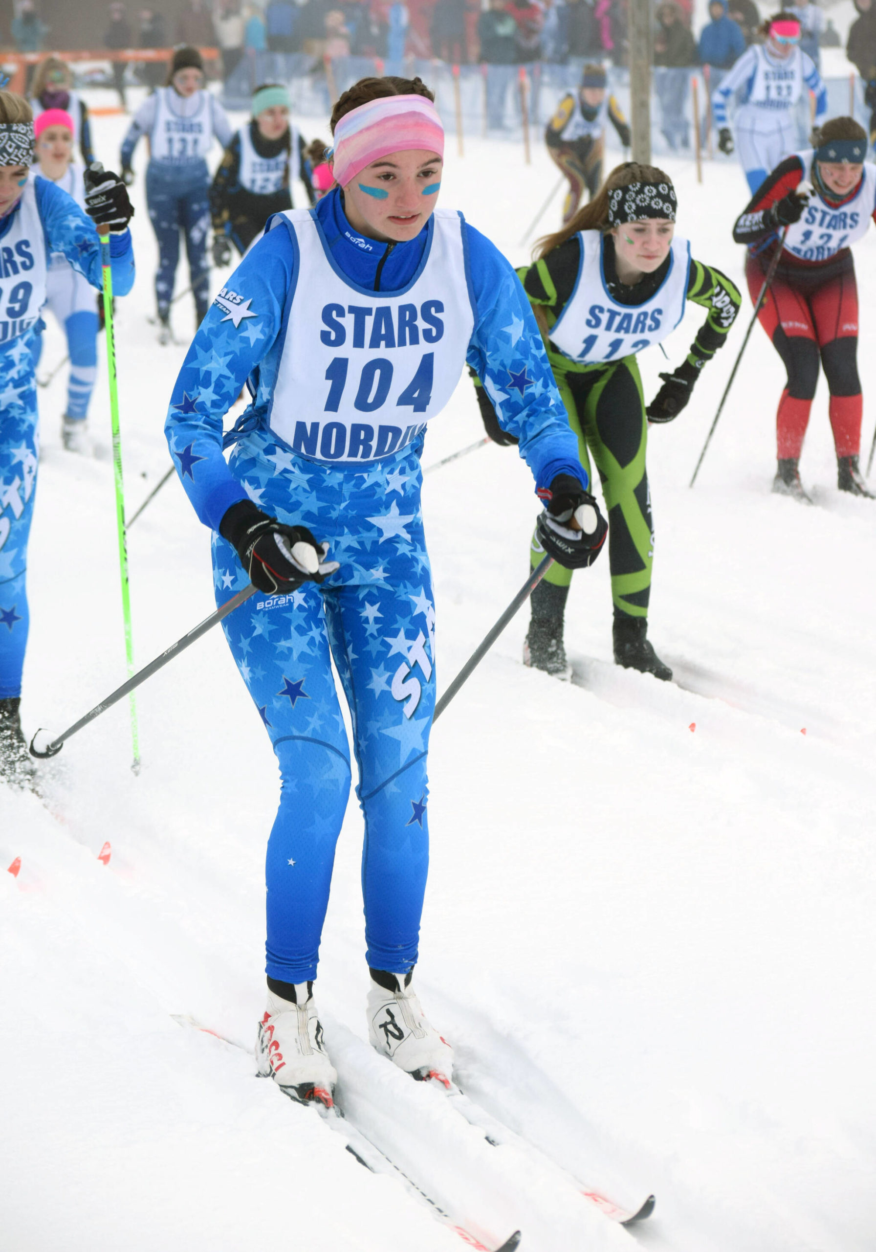Soldotnas Jordan Ruffner starts the girls 5-kilometer classic mass start race Saturday, Feb. 12, 2022, at the Region III ski championships at Tsalteshi Trails just outside of Soldotna, Alaska. (Photo by Camille Botello/Peninsula Clarion)
