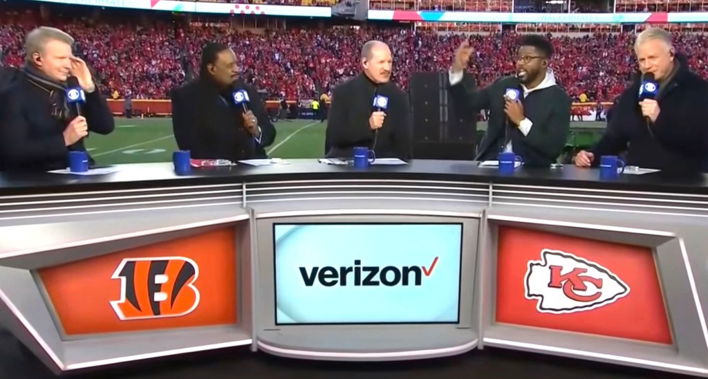 The CBS NFL halftime crew of (from left) Phil Simms, James Brown, Bill Cowher, Nate Burleson and Boomer Esiason had to try to shout over the stadium speakers during halftime of Sunday’s Bengals-Chiefs game.